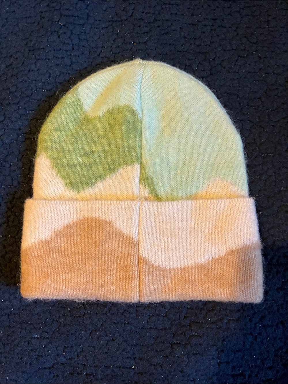 Anthropologie Maeve knit beanie features a pastel landscape pattern